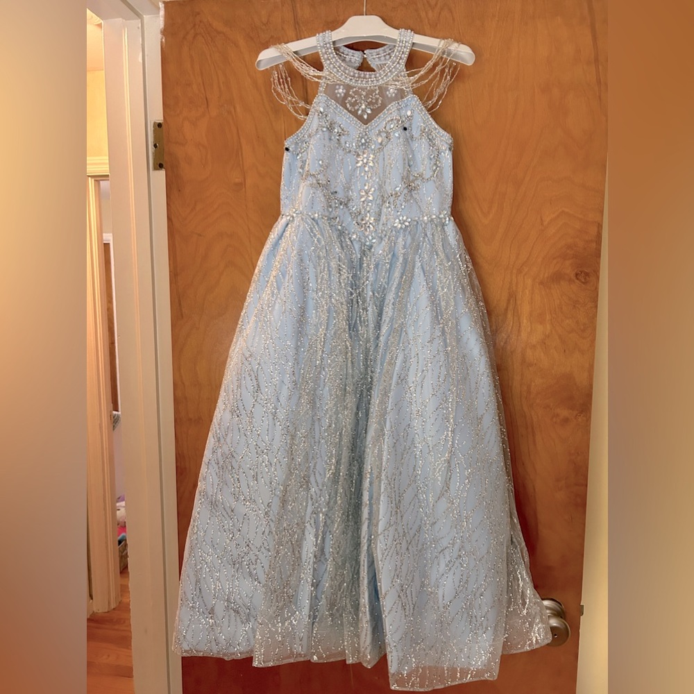 Beautiful light blue sparkling beaded pageant gown.